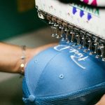 How to Choose Between Embroidery and Screen Printing for Your Brand Merchandise